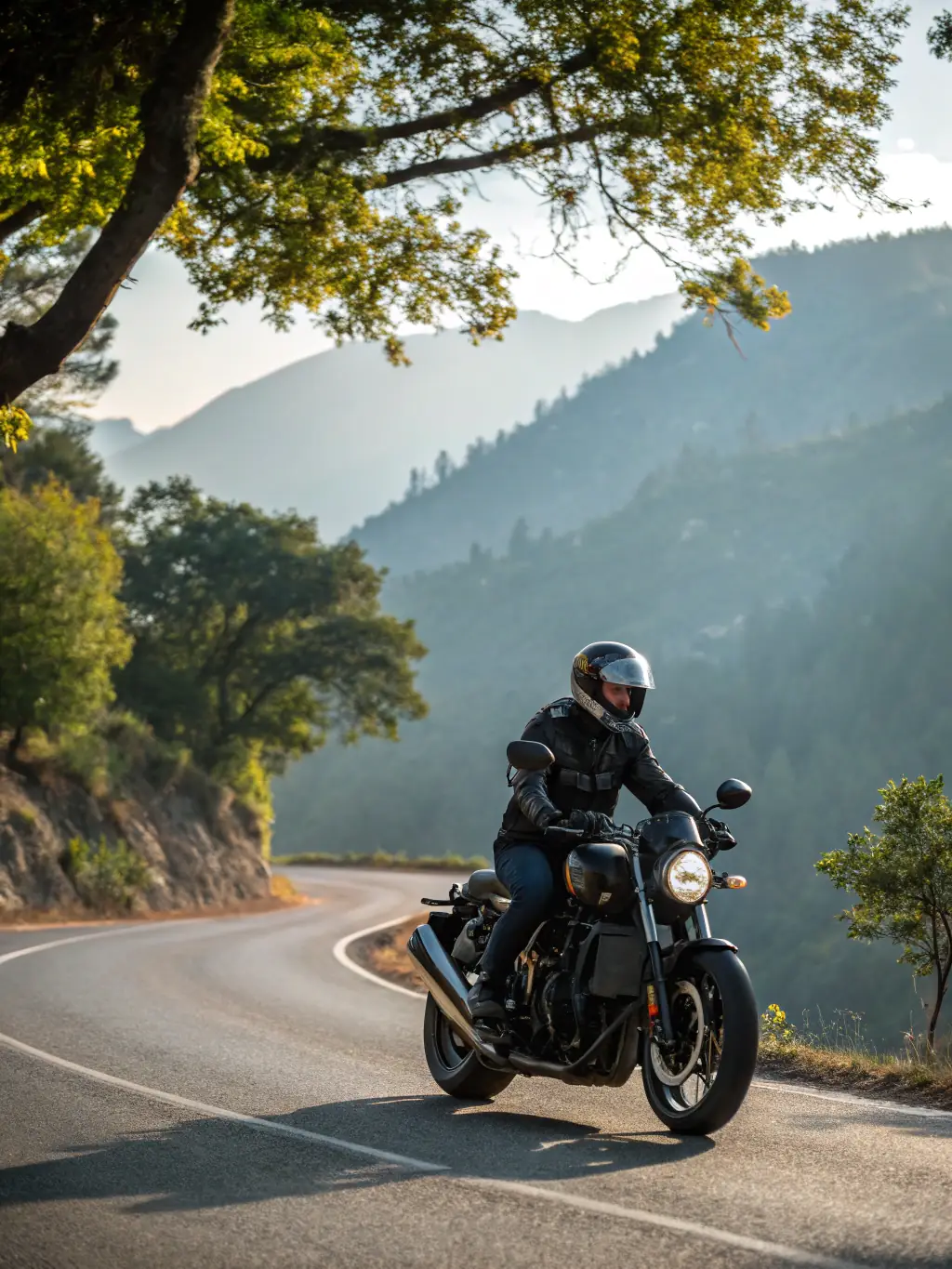 A close-up shot of a motorcycle rider confidently navigating a winding mountain road, showcasing the thrill and freedom of riding with FMF 04.
